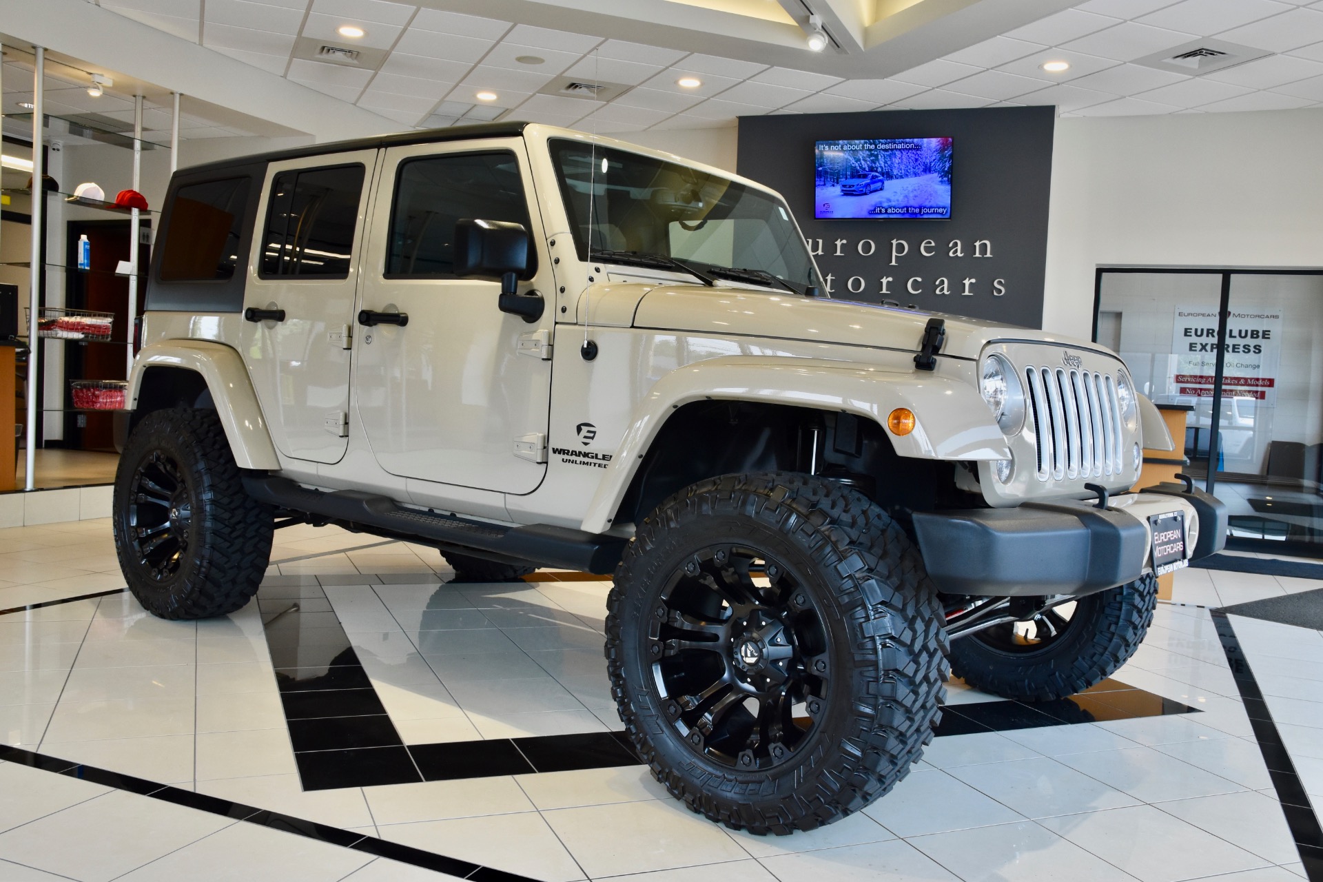 Lifted Jeep Wrangler 4 Door Tan