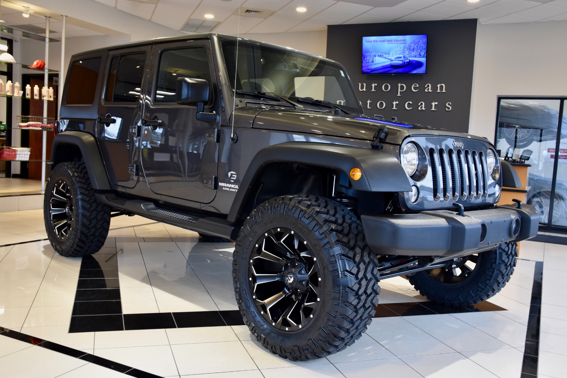 Used 2017 Jeep Wrangler Unlimited EMC Custom lifted Sport S For Sale ($29,990) | European Motorcars Stock #615398 Used 2017 Jeep Wrangler Unlimited EMC Custom lifted Sport S For Sale ($29,990) | European Motorcars Stock #615398